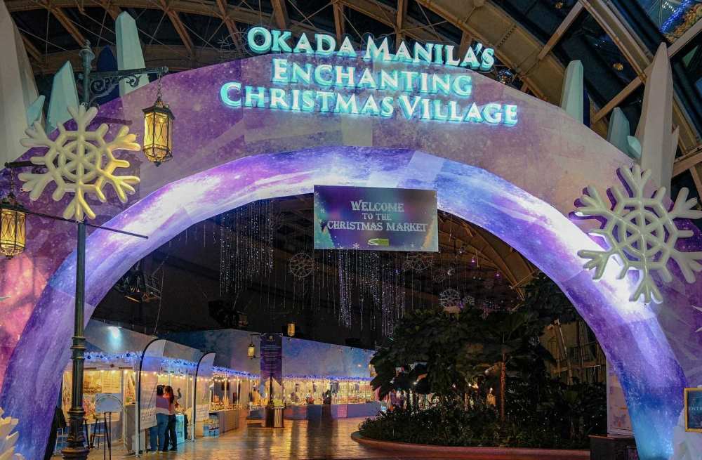 colorful purple arc with small stalls inside