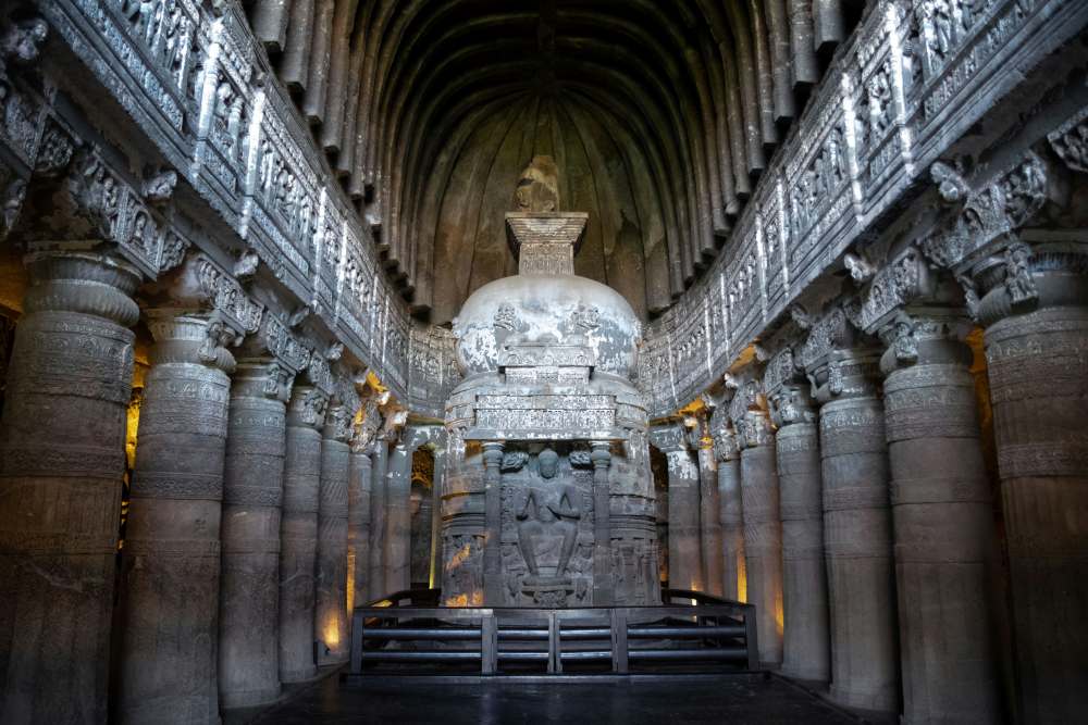 grey concrete inside building with statues