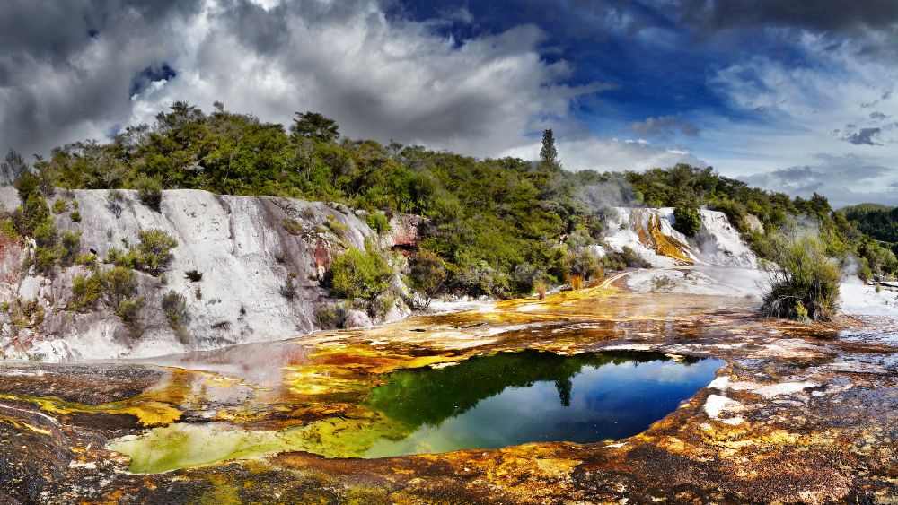 bubbling mud pool with steam - Things to do in New Zealand north island