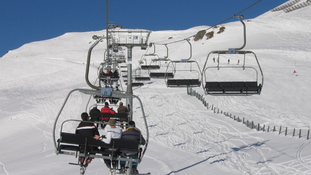 new zealand chairlift rides on top of the mountain