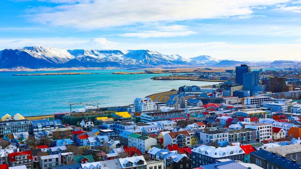 colorful houses and buildings near the ocean - Beautiful Islands